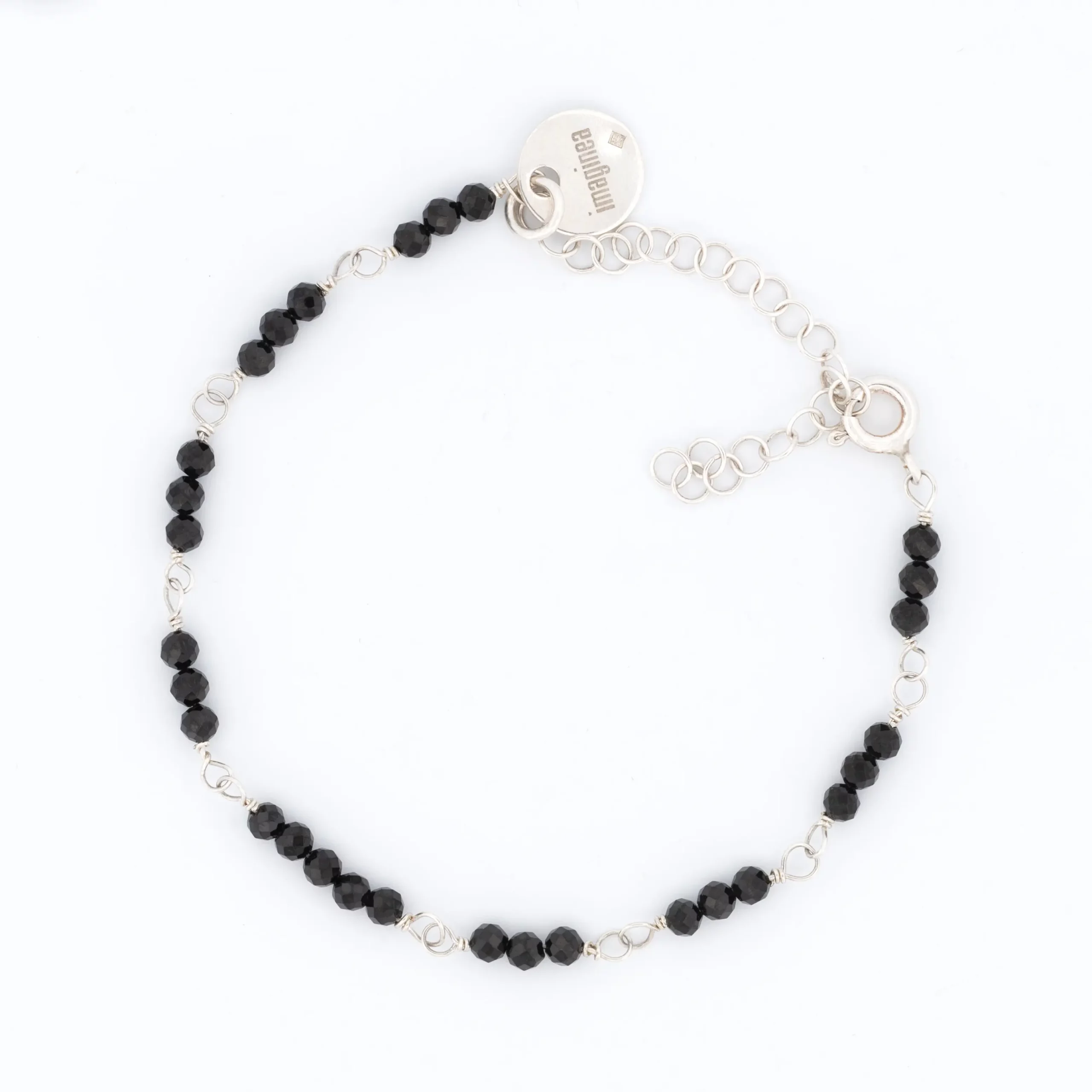 Bransoletka łańcuszkowa srebrna z kolekcji Simple z czarnymi onyksami.