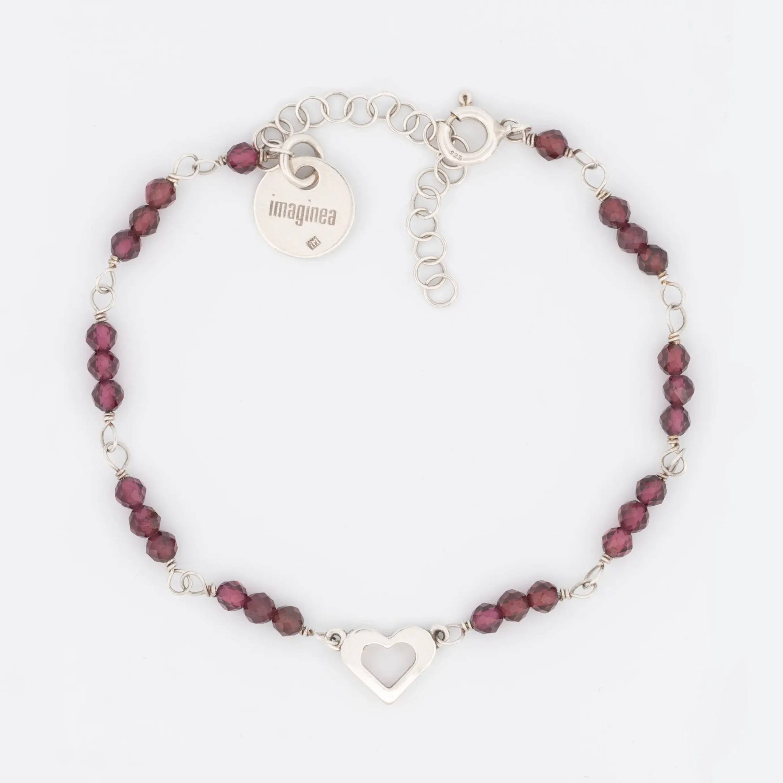 Srebrna bransoletka z kolekcji Serce z granatami.