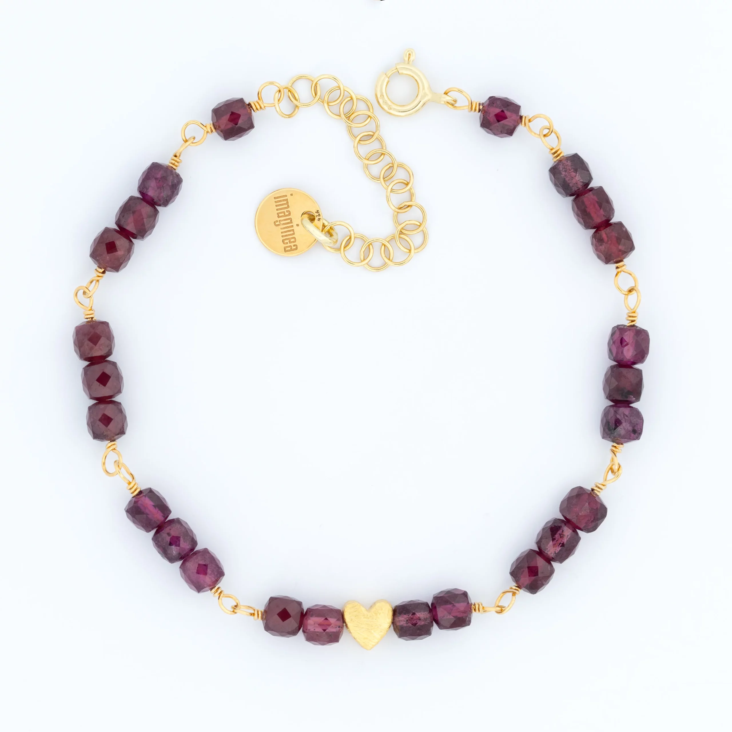 Srebrna, pozłacana bransoletka z granatem z kolekcji Serce, packshot.